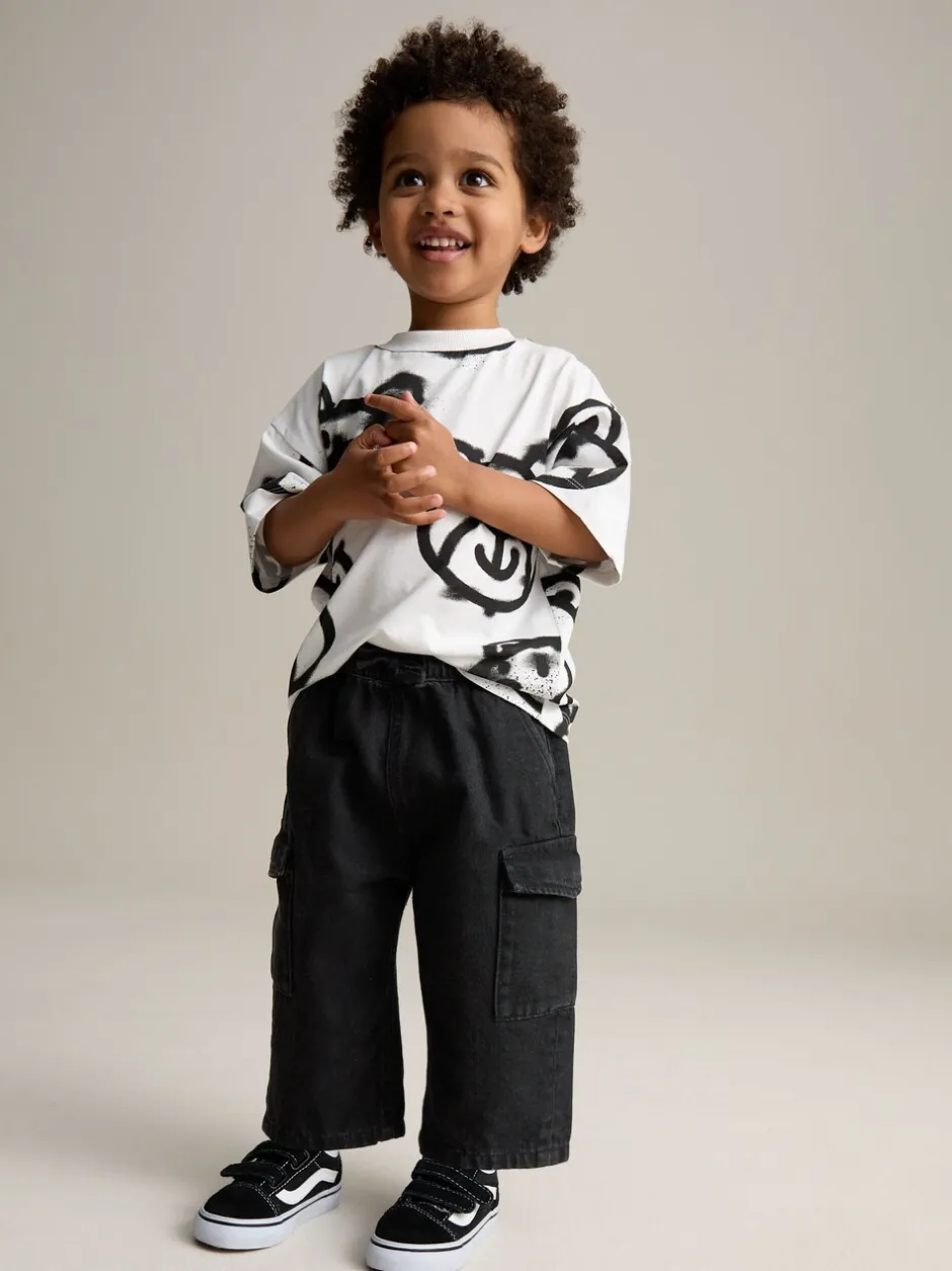 Jeans En Joggingbroeken|Jeans*Next - 100% katoenen cargobroek met wijde pijpen en elastische taille (3mnd-7jr) Zwart denim