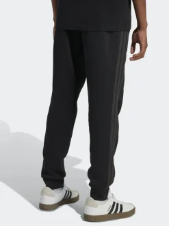 Joggingbroeken|adidas - Essentials fleece joggingbroek met 3 strepen Zwart Ground