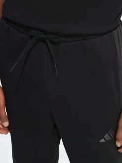 Joggingbroeken|adidas - Essentials fleece joggingbroek met 3 strepen Zwart Ground