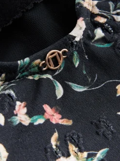 Badkleding|Next Zwart met broderie en fijne print - Badpak met vormgevende zijrimpeling en buikcorrectie
