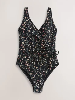 Badkleding|Next Zwart met broderie en fijne print - Badpak met vormgevende zijrimpeling en buikcorrectie