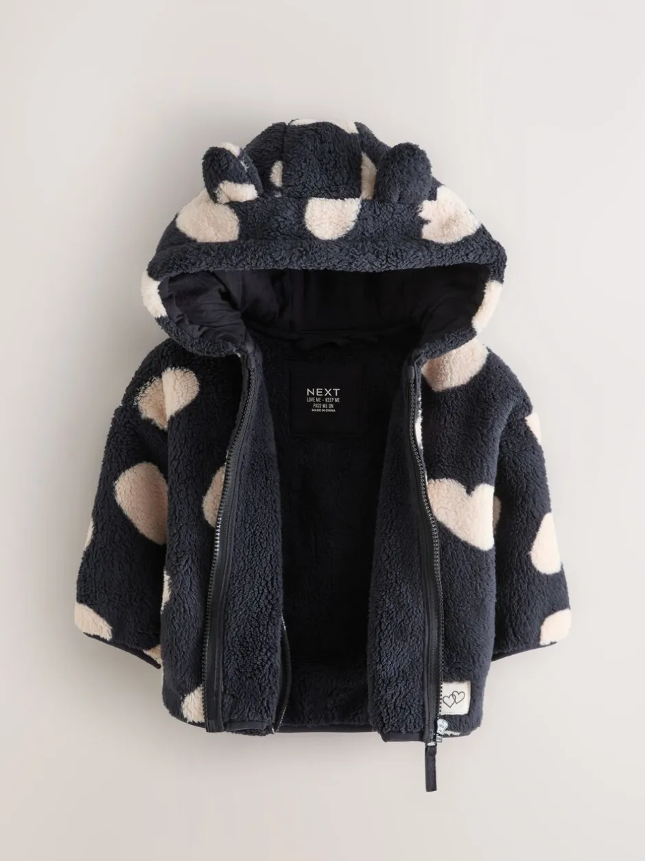 Truien En Breisels|Jassen, Jacks En Kinderwagenpakjes|Next - Fleece met ritssluiting (3mnd-7jr) Zwart met hartjesprint