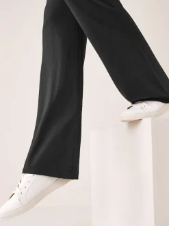 Leggings En Joggingbroeken*Next - - Onverkorte legging Zwart met uilopende pijpen