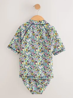 Badkleding*Next - Sunsafe Rash Vest Bikini And Scrunchie Swim Set (3-16yrs) Zwart met vrolijke bloemenprint