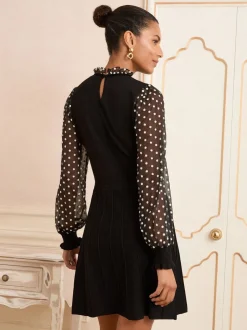 Gebreide Kleding|Jurken*Love & Roses - Frill Neck Chiffon Sleeve Knitted Mini Dress Zwarte Bloemen Vlek Franje Hals