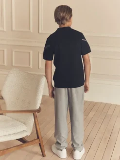 Truien En Breisels*Next - Gebreid poloshirt met rits bij de hals (3-16jr) Zwarte ruit
