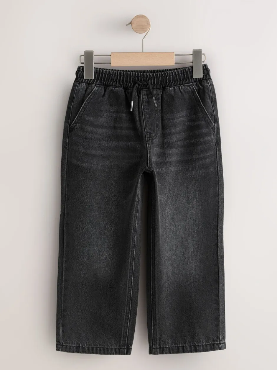 Jeans*Next - Denim jeans met elastische taille (3-16jr) Zwarte wassing