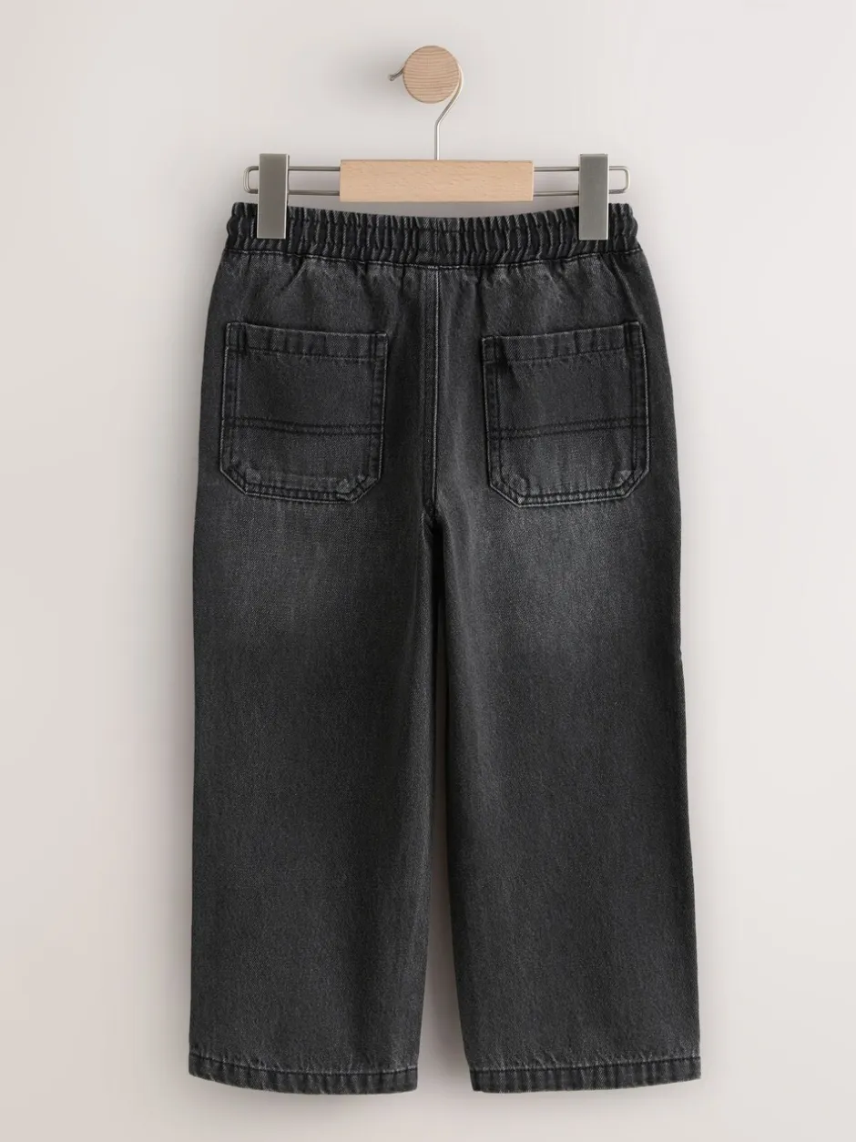 Jeans*Next - Denim jeans met elastische taille (3-16jr) Zwarte wassing