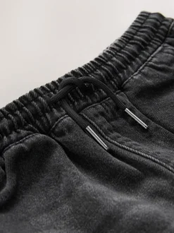 Jeans*Next - Denim jeans met elastische taille (3-16jr) Zwarte wassing