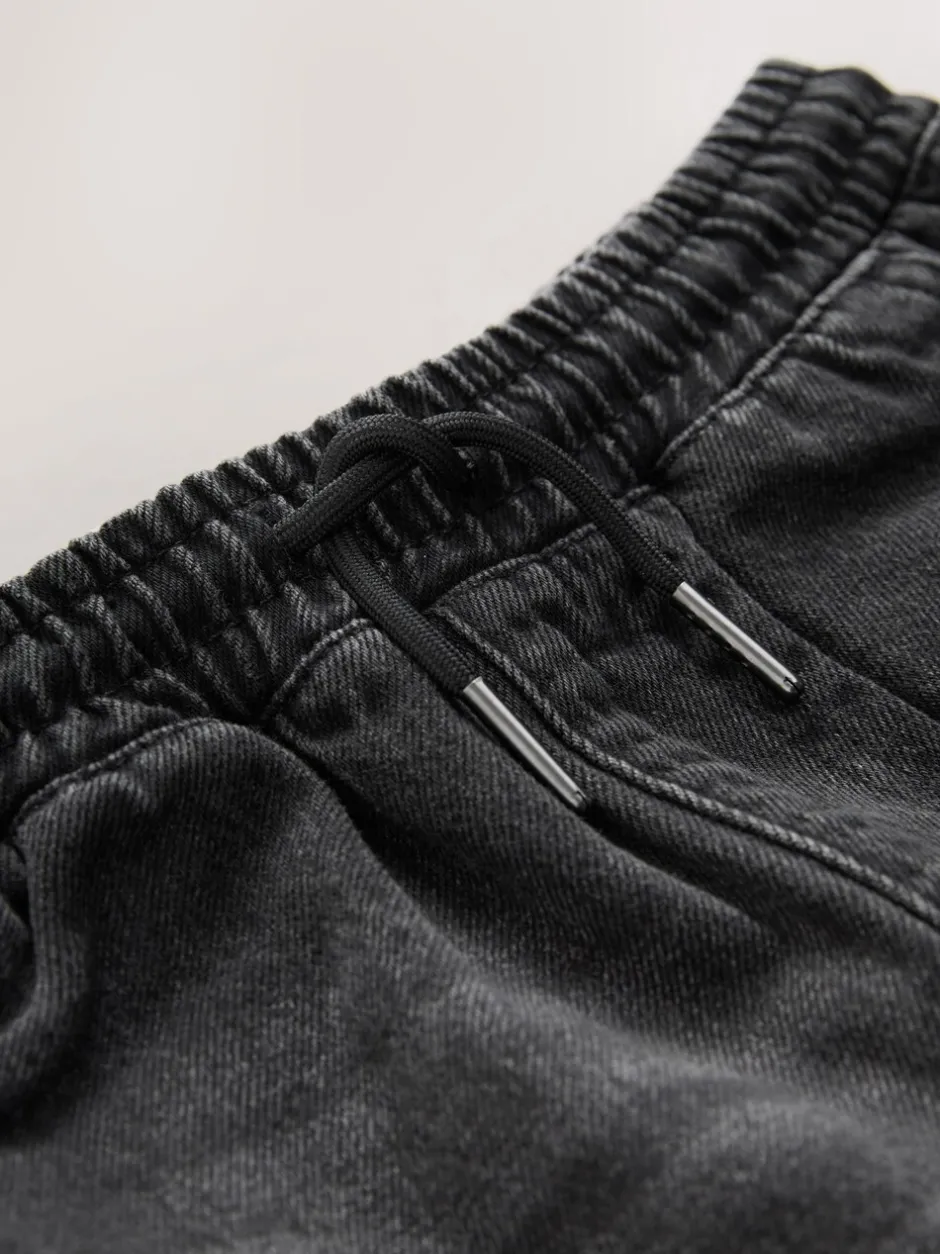 Jeans*Next - Denim jeans met elastische taille (3-16jr) Zwarte wassing