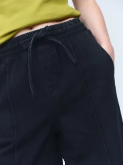 Jeans|Next - Denim joggingbroek met plooitjes en wijde pijpen Zwarte wassing