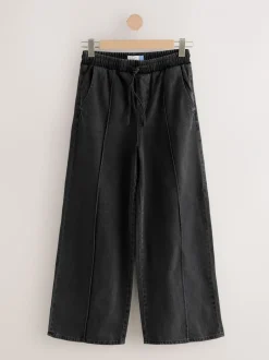 Jeans|Next - Denim joggingbroek met plooitjes en wijde pijpen Zwarte wassing