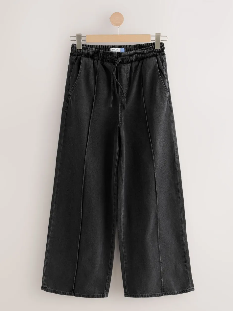 Jeans|Next - Denim joggingbroek met plooitjes en wijde pijpen Zwarte wassing