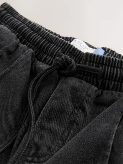 Jeans|Next - Denim joggingbroek met plooitjes en wijde pijpen Zwarte wassing