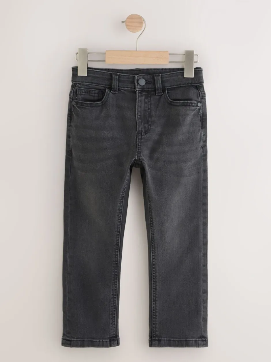 Jeans|Next Zwarte wassing - Stretchjeans (3-17jr)