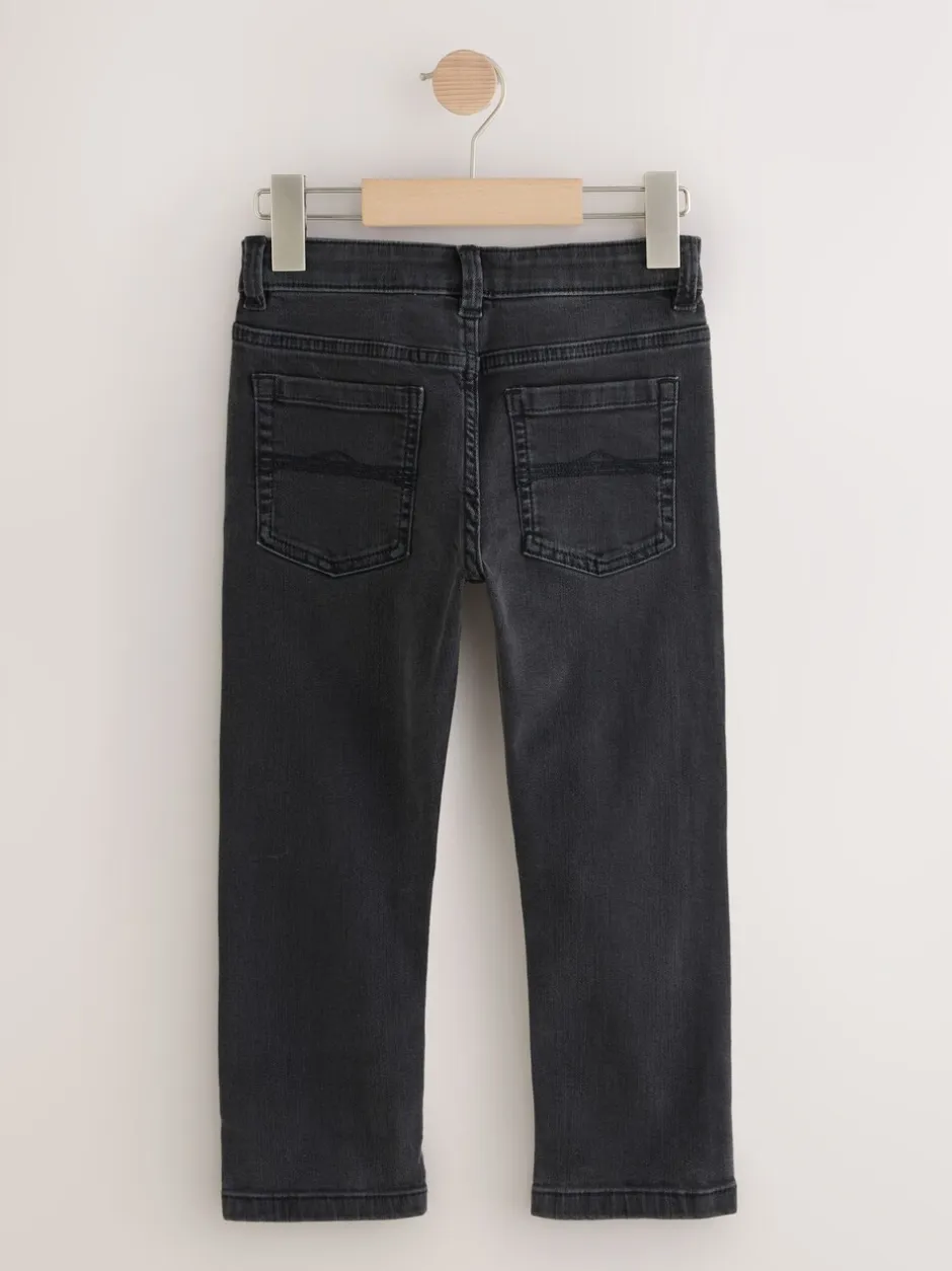 Jeans|Next Zwarte wassing - Stretchjeans (3-17jr)