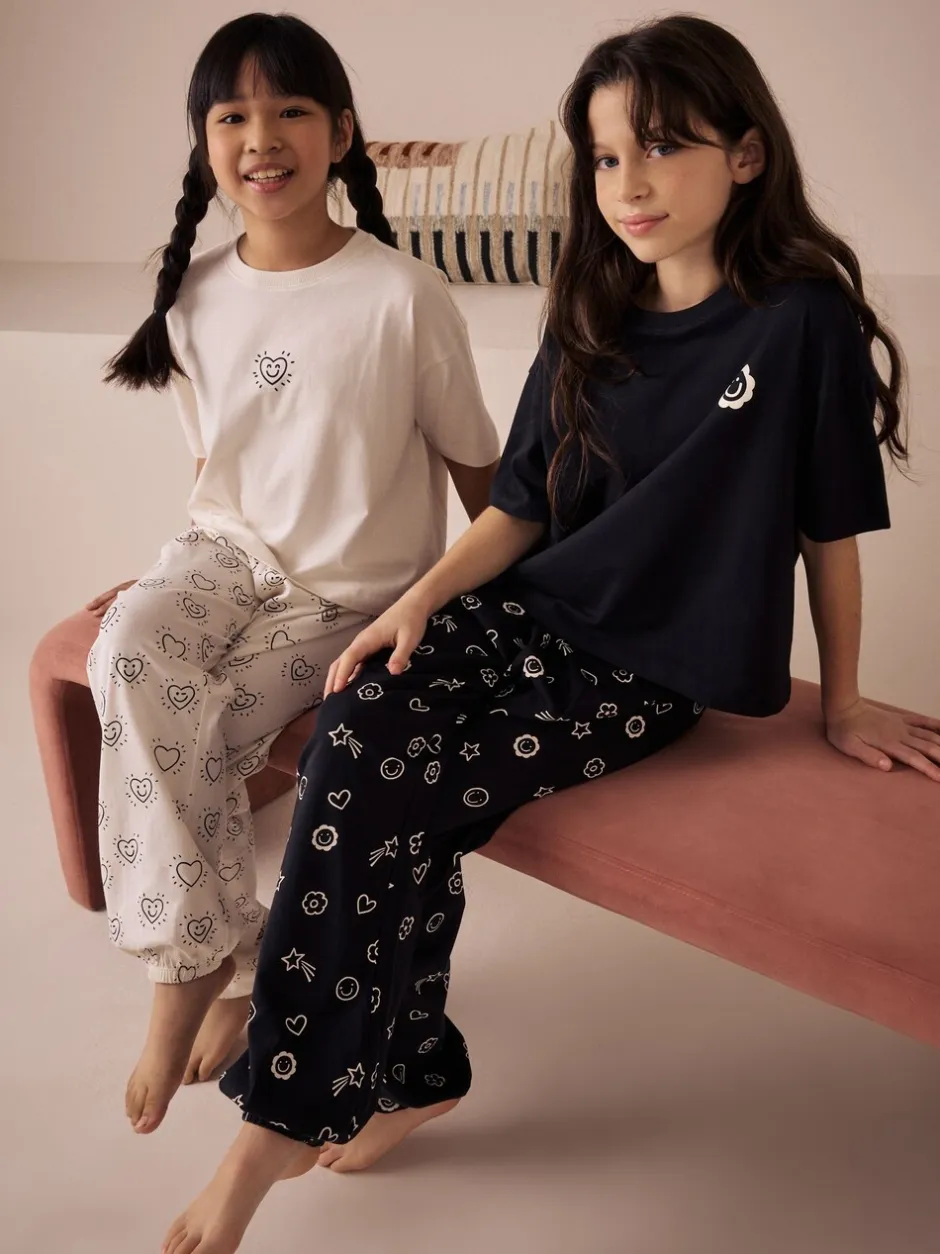 Nachtkleding En Pyjama's|Pyjama's|Next - Verpakking van 2 pyjama's met joggingbroek (3-16 jr) Zwart/ecru