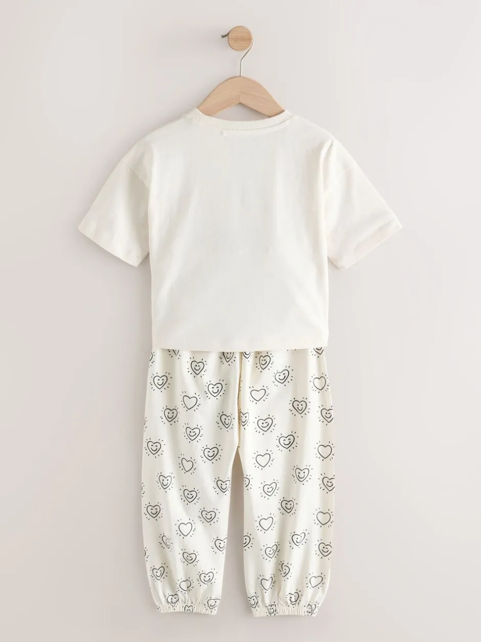 Nachtkleding En Pyjama's|Pyjama's|Next - Verpakking van 2 pyjama's met joggingbroek (3-16 jr) Zwart/ecru