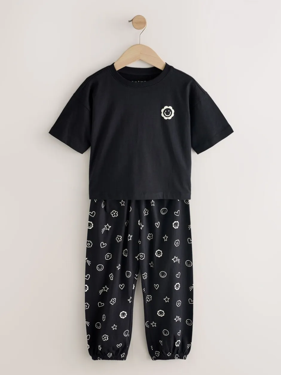 Nachtkleding En Pyjama's|Pyjama's|Next - Verpakking van 2 pyjama's met joggingbroek (3-16 jr) Zwart/ecru