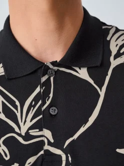 Poloshirts|Next Zwartgoud met bloemenprint - Poloshirt met korte mouwen en print