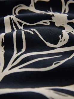 Poloshirts|Next Zwartgoud met bloemenprint - Poloshirt met korte mouwen en print