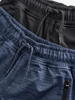 Joggingbroeken|Next - Slim-fit joggingbroek met ritszak (3-16jr) Zwart/marineblauw