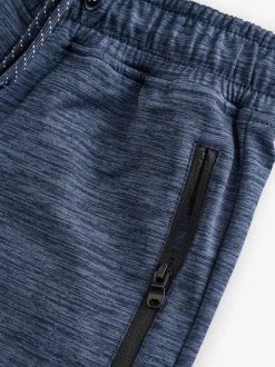 Joggingbroeken|Next - Slim-fit joggingbroek met ritszak (3-16jr) Zwart/marineblauw