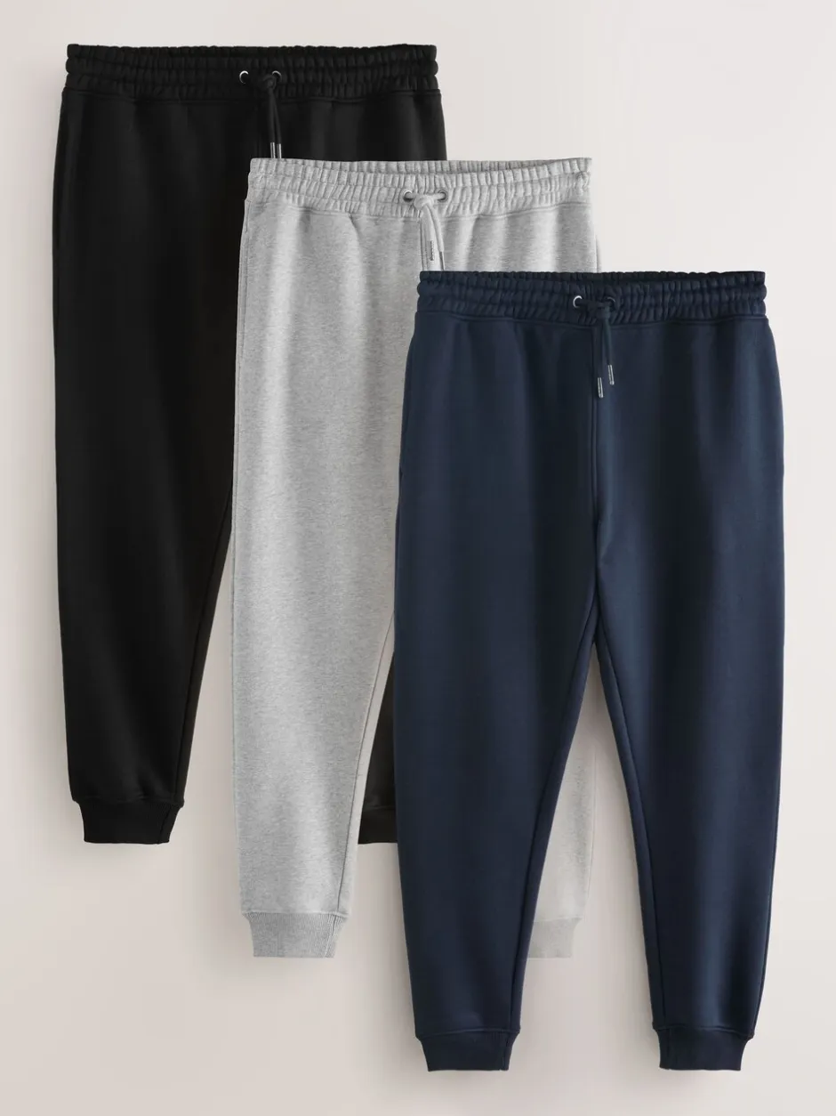 Joggingbroeken|Next - Verpakking van 3 slim-fit jersey joggingbroeken met hoog katoengehalte Zwart/marineblauw/grijs