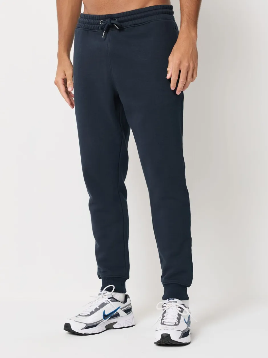 Joggingbroeken|Next - Verpakking van 3 slim-fit jersey joggingbroeken met hoog katoengehalte Zwart/marineblauw/grijs