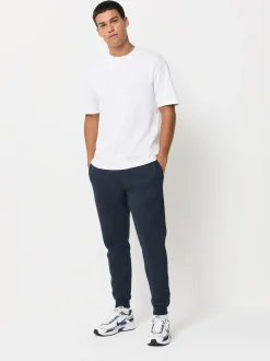 Joggingbroeken|Next - Verpakking van 3 slim-fit jersey joggingbroeken met hoog katoengehalte Zwart/marineblauw/grijs