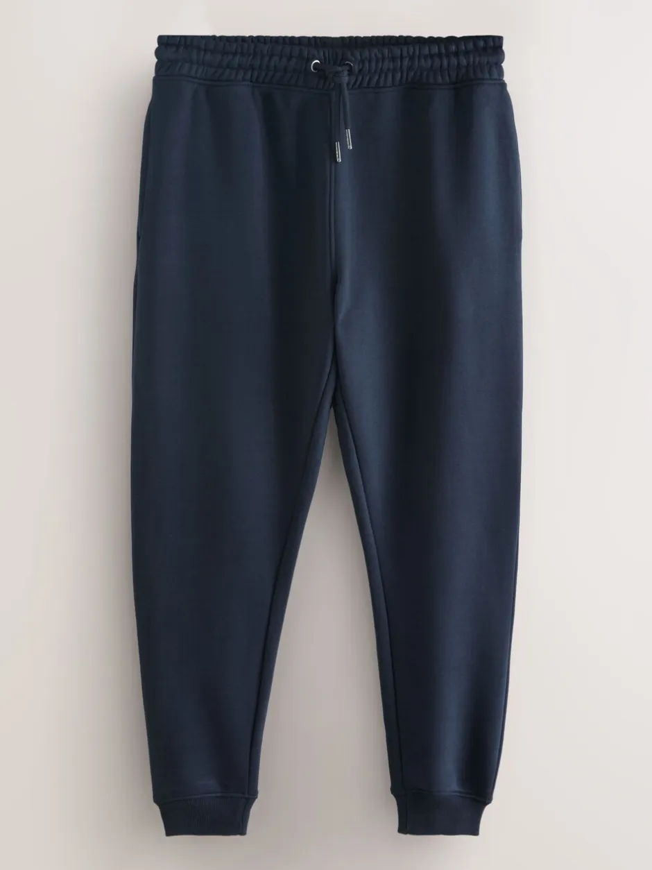 Joggingbroeken|Next - Verpakking van 3 slim-fit jersey joggingbroeken met hoog katoengehalte Zwart/marineblauw/grijs