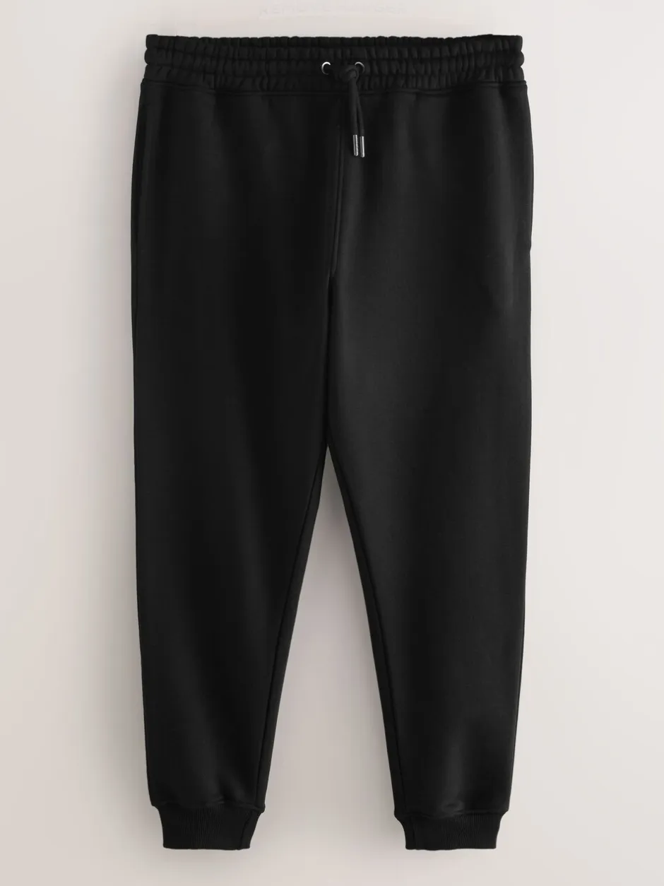 Joggingbroeken|Next - Verpakking van 3 slim-fit jersey joggingbroeken met hoog katoengehalte Zwart/marineblauw/grijs