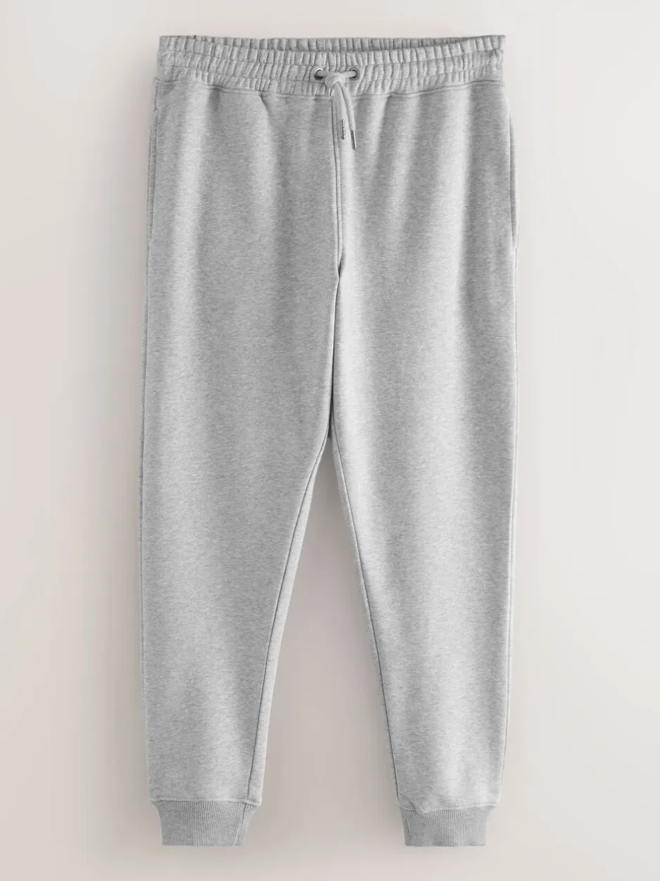 Joggingbroeken|Next - Verpakking van 3 slim-fit jersey joggingbroeken met hoog katoengehalte Zwart/marineblauw/grijs