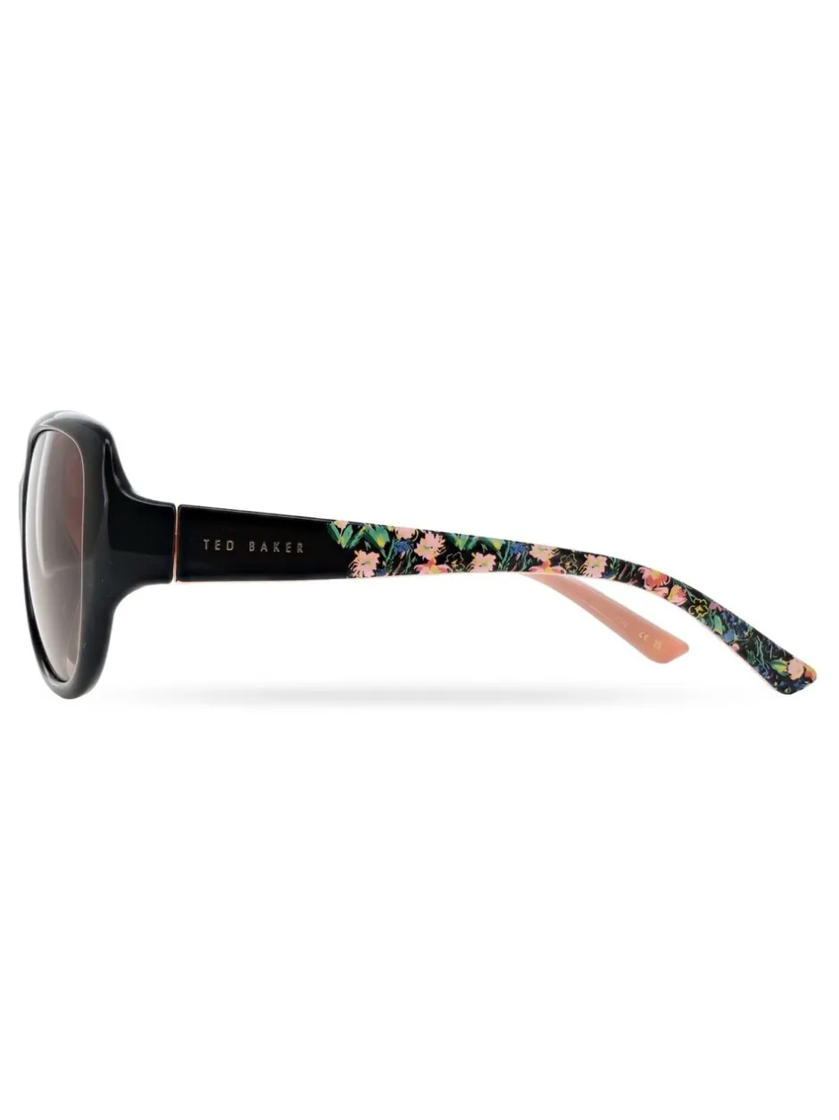Zonnebril|Ted Baker Zwart/roze - - Oversized dameszonnebril met exclusieve bloemenprint op de zijkanten