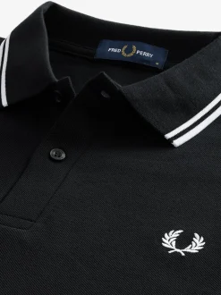 Poloshirts|Fred Perry Zwart/wit - poloshirt met tweekleurige streep op de mouw