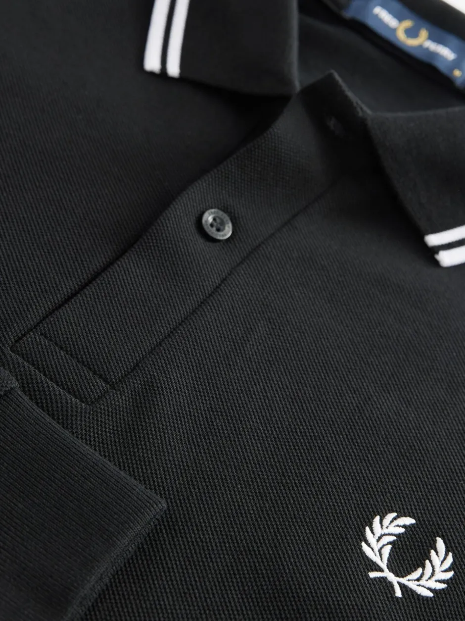 Poloshirts|Fred Perry Zwart/wit - poloshirt met tweekleurige streep op de mouw