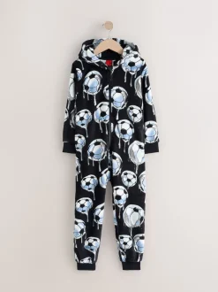 Nachtkleding En Pyjama's|Pyjama's|Next - All-in-ones fleece pyjama (3-16jr) Zwart/wit met voetbal