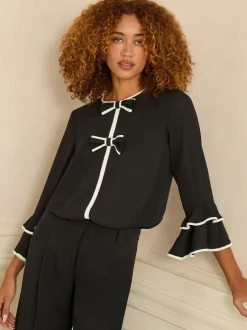 Blouses En Overhemden*Love & Roses - Crew Neck Pleated Flute Sleeve Blouse Zwart-witte strik